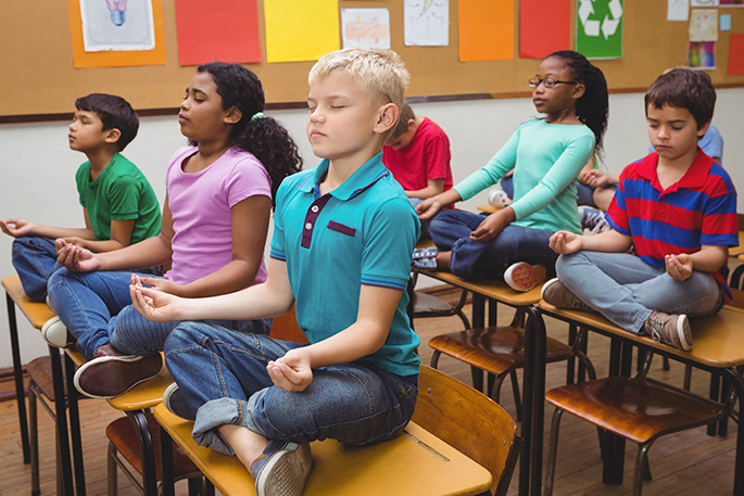 Les bienfaits du yoga à l’école